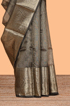 Charcoal grey unique zari design art tissue saree with self zari border and matching blouse