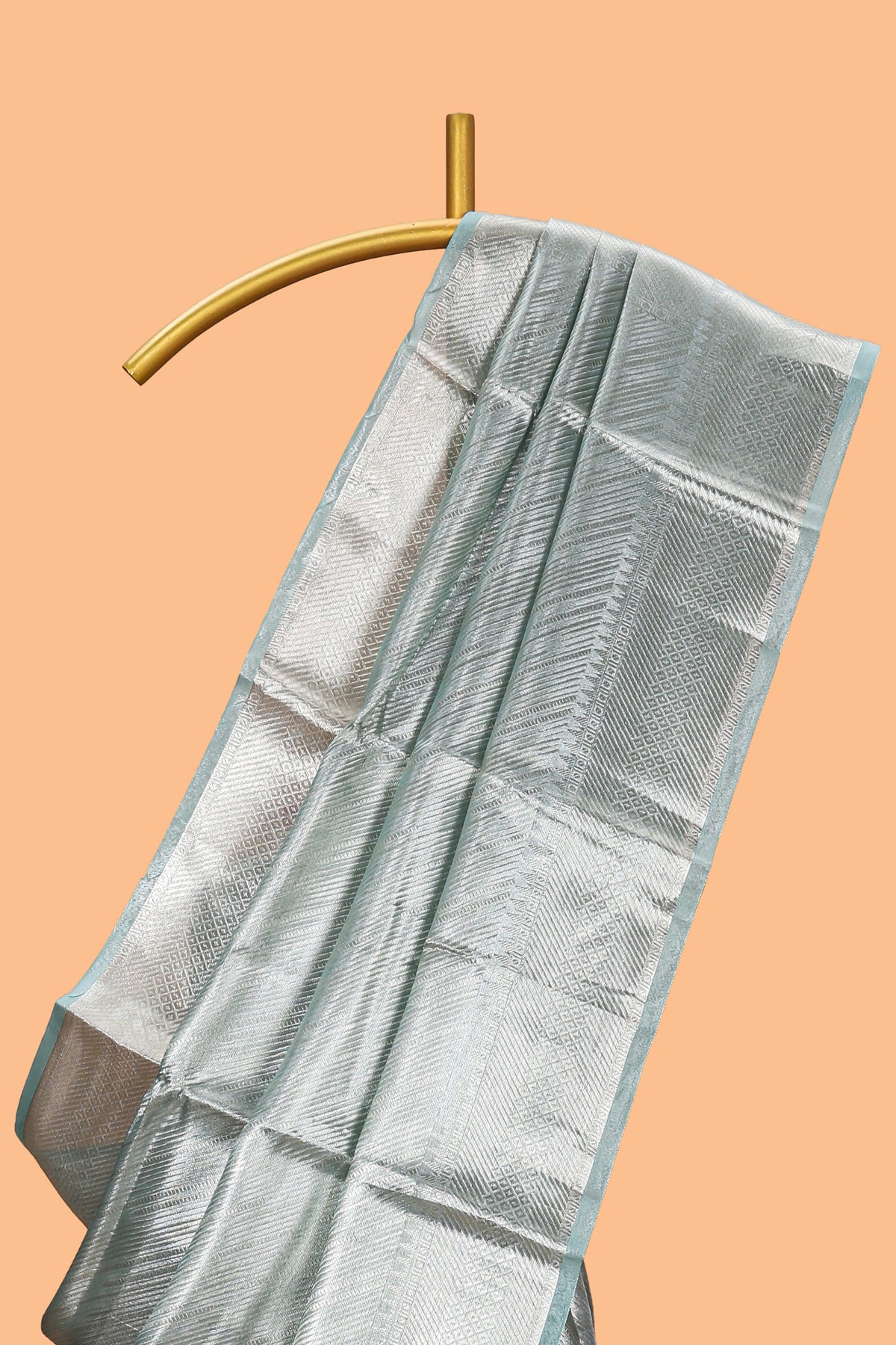 Pastel green vertical striped design art tissue saree with self zari border and matching blouse