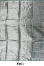 Pastel green vertical striped design art tissue saree with self zari border and matching blouse
