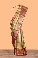 Mustard yellow geometric design art tissue saree with contrast zari border and blouse