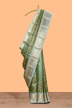 Green unique design zari motifs art tissue saree with contrast border and blouse