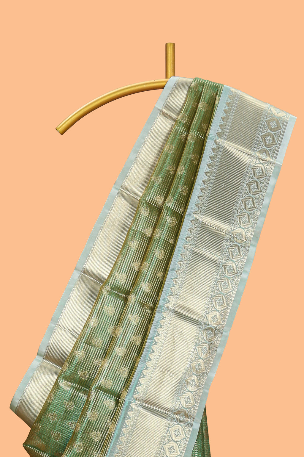 Green unique design zari motifs art tissue saree with contrast border and blouse