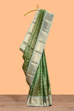 Green unique design zari motifs art tissue saree with contrast border and blouse