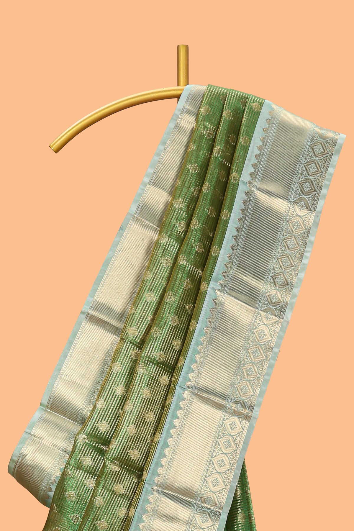 Green unique design zari motifs art tissue saree with contrast border and blouse