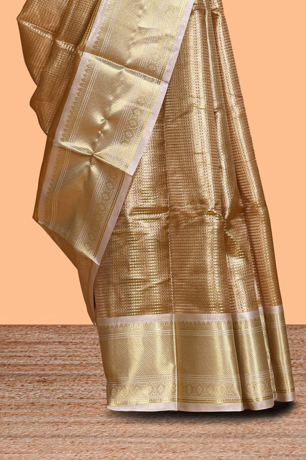 Gold small zari checks design art tissue saree with contrast border and blouse
