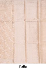 Beige floral zari design art tissue saree with self pallu and matching blouse