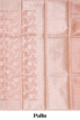 Warm peach floral vine design art tissue saree with zari work border and blouse