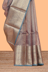 Mauve shade art tissue saree with antique gold zari border and contrast blouse