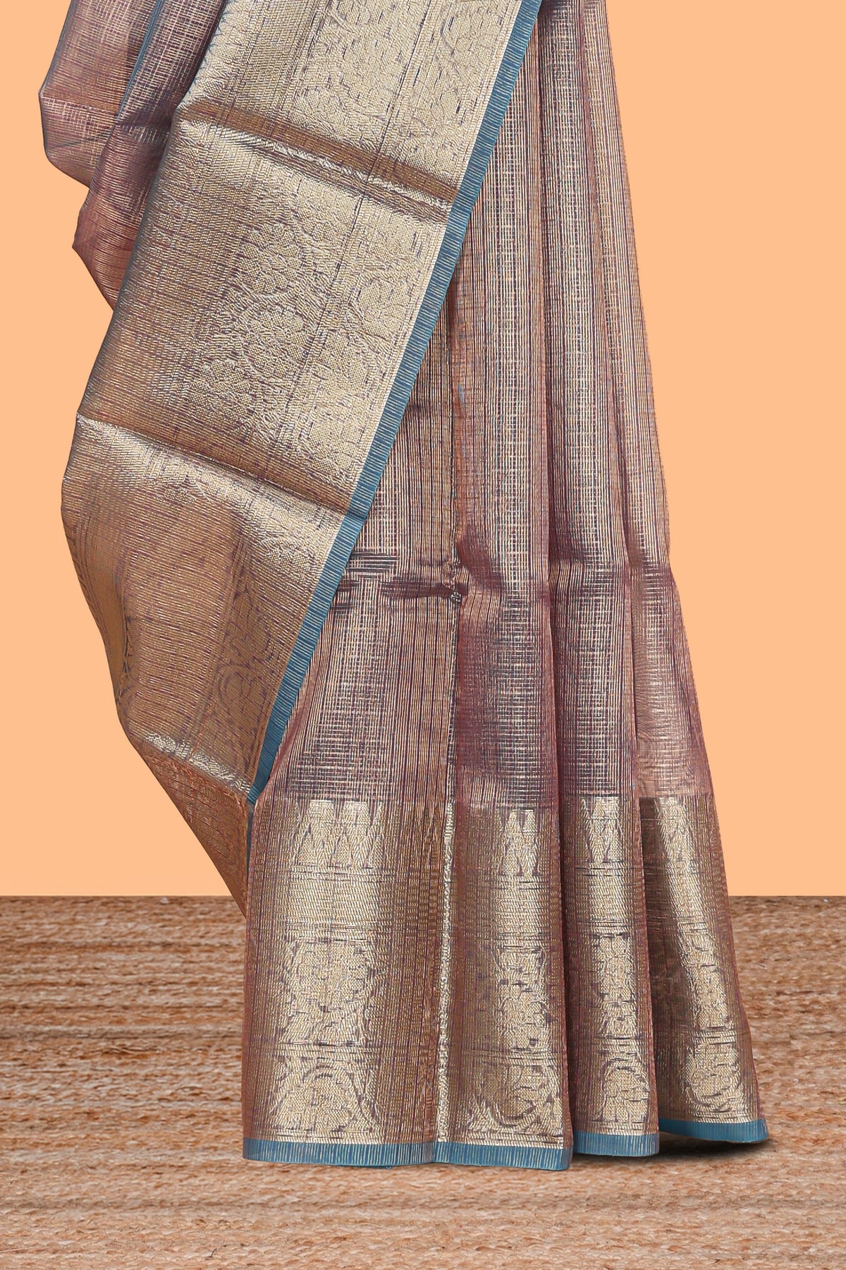 Mauve shade art tissue saree with antique gold zari border and contrast blouse