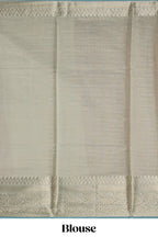 Mauve shade art tissue saree with antique gold zari border and contrast blouse