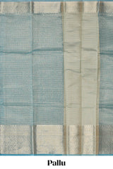 Teal blue Checked art tissue saree with floral zari border and contrast blouse
