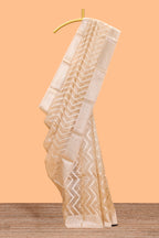 Pale peach geometric design art tissue saree with zari border and plain blouse