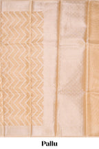 Pale peach geometric design art tissue saree with zari border and plain blouse
