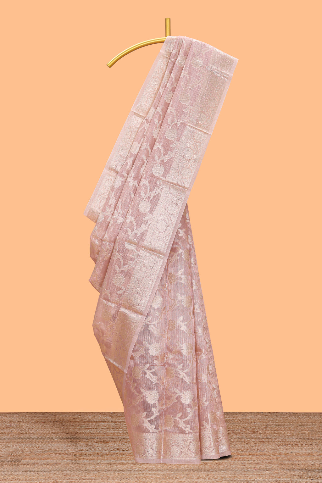 Pastel peach floral vine design art tissue saree with zari border and blouse