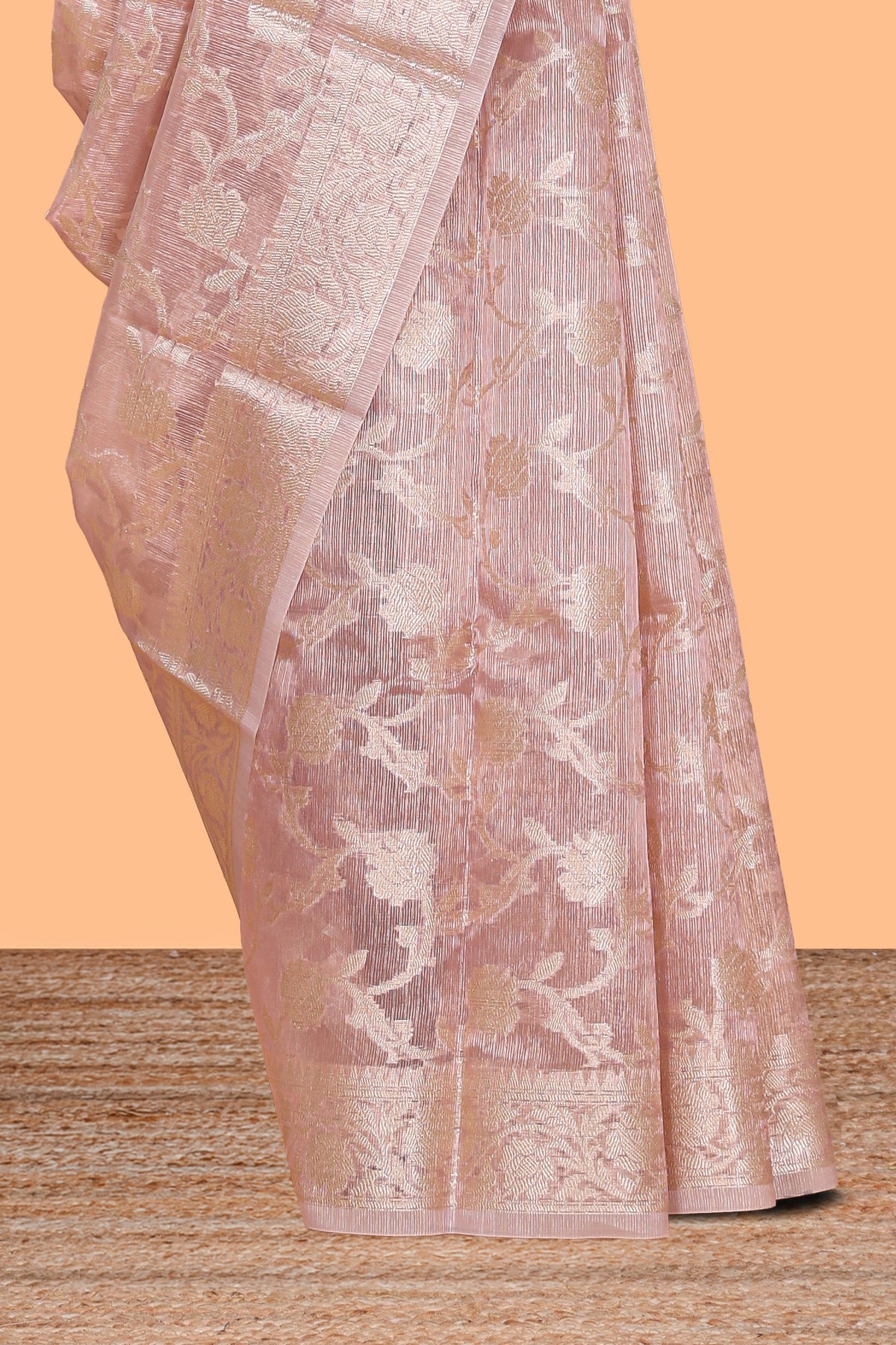 Pastel peach floral vine design art tissue saree with zari border and blouse