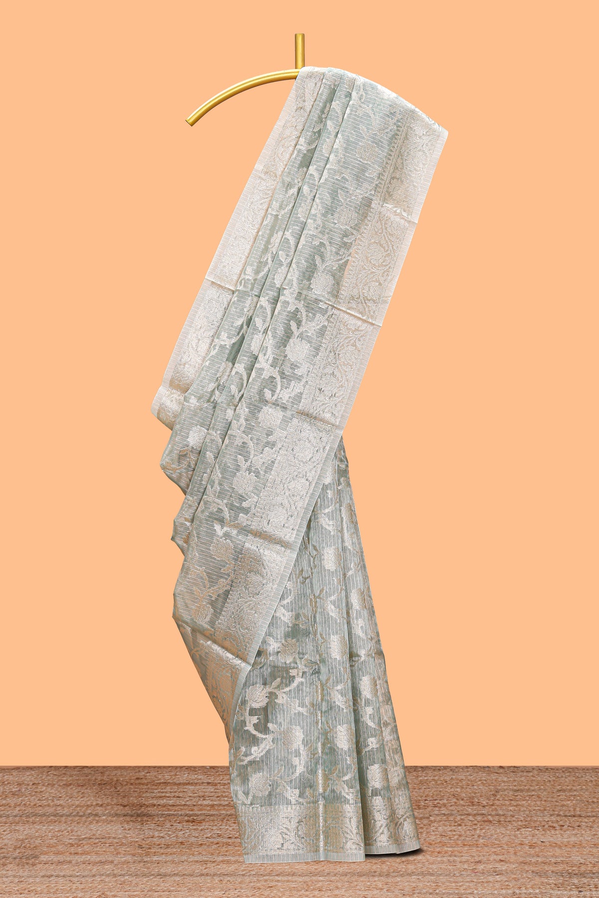 Silver sage green floral design art tissue saree with silver zari border and blouse