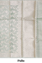 Silver sage green floral design art tissue saree with silver zari border and blouse