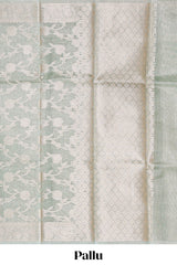 Silver sage green floral design art tissue saree with silver zari border and blouse