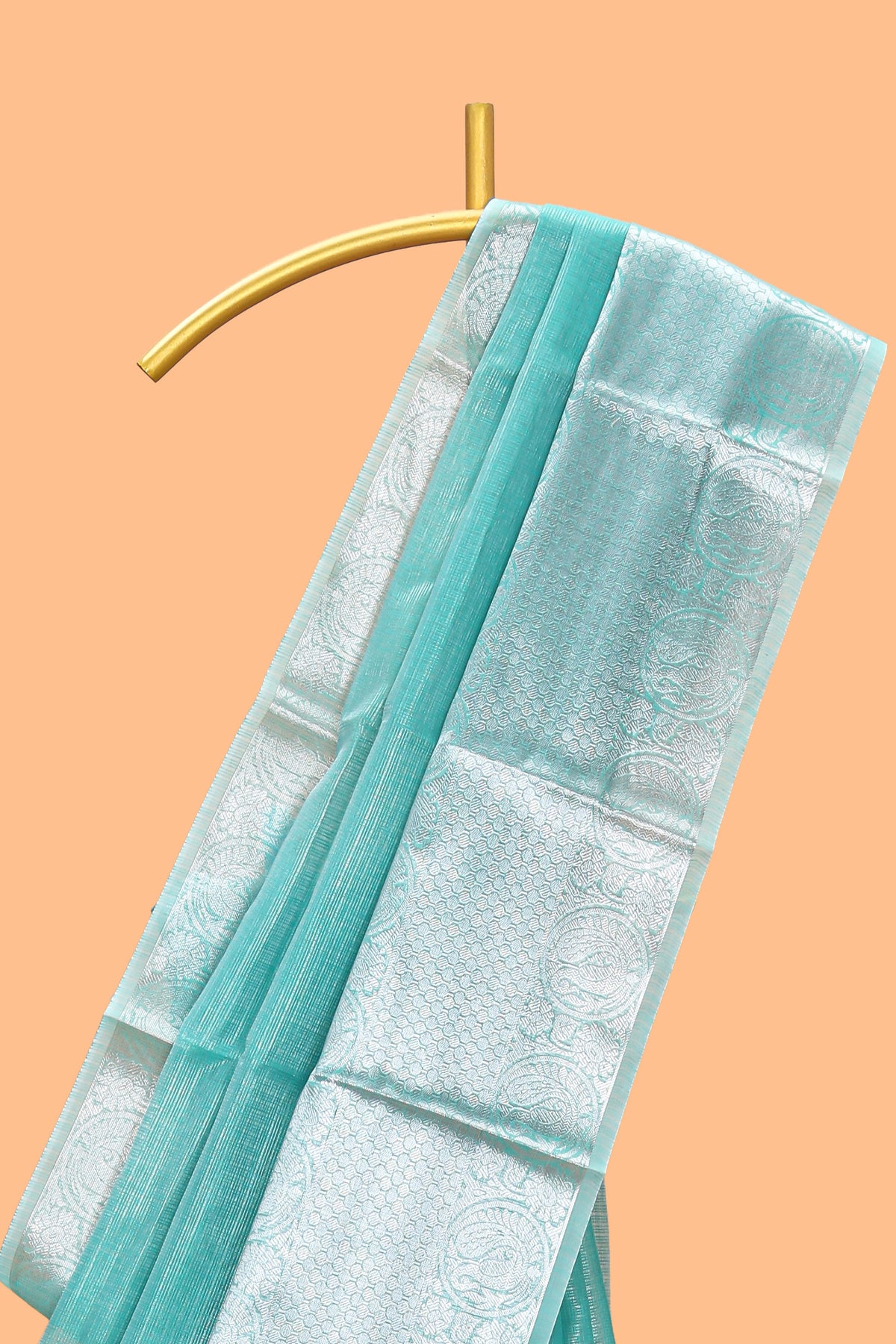 Peacock green shade plain art tissue saree with silver zari border and matching blouse