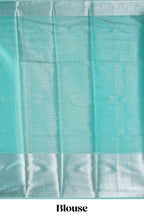 Peacock green shade plain art tissue saree with silver zari border and matching blouse