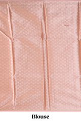 Peach color geometric design art tissue saree with contrast zari border and matching blouse