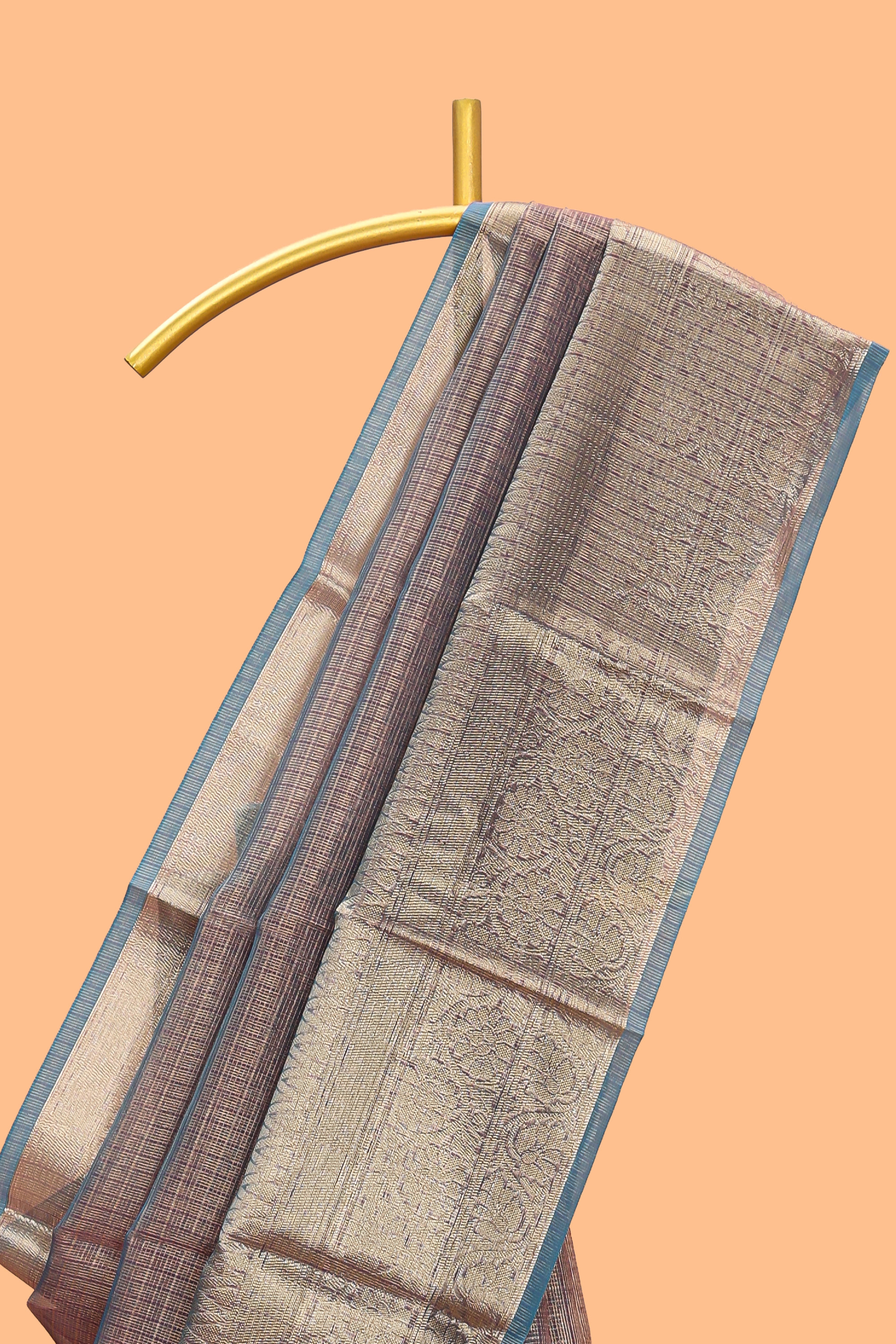 Blue shade checked art tissue saree with contrast zari border and blouse