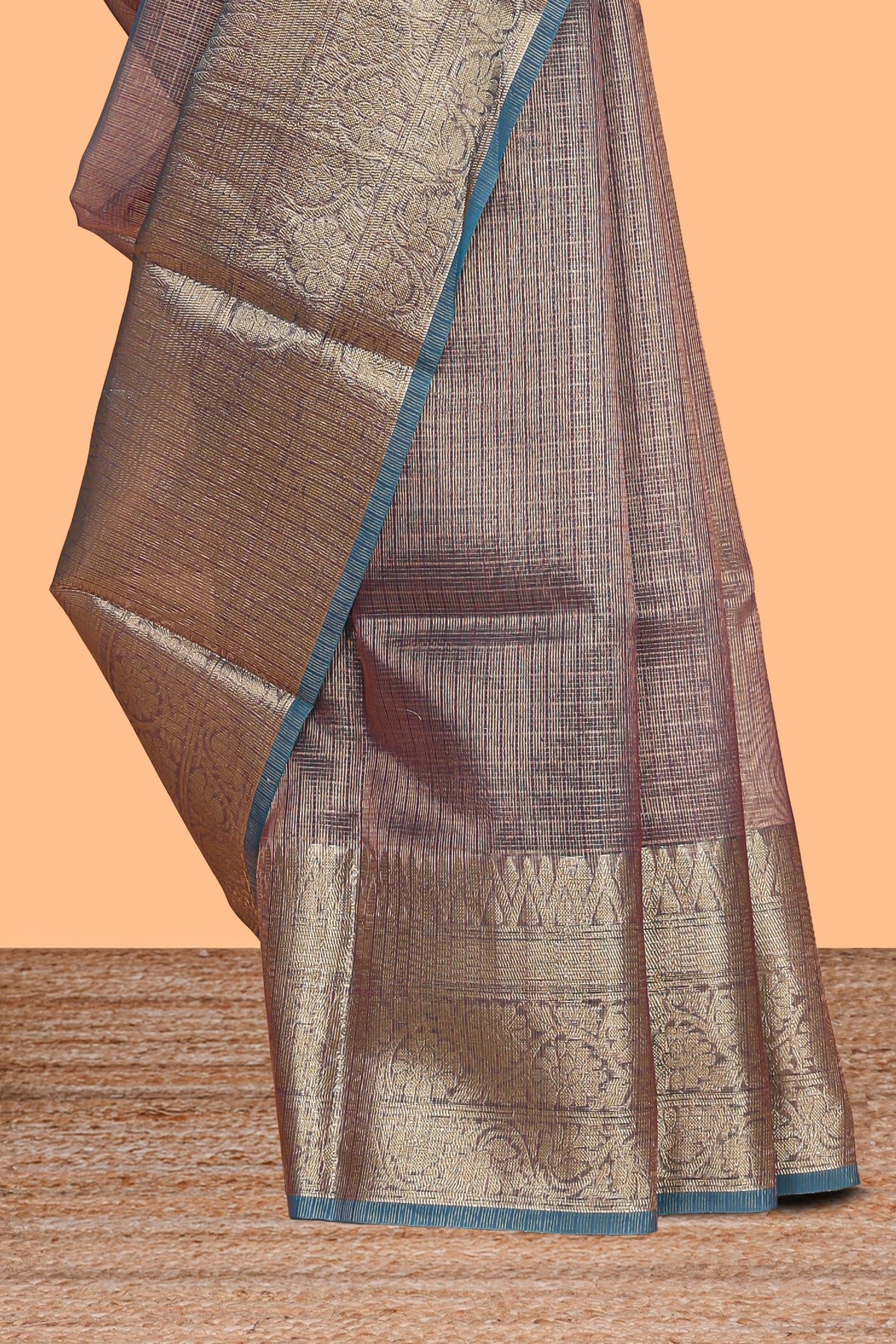 Blue shade checked art tissue saree with contrast zari border and blouse