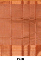 Rust orange checked art tissue saree with contrast zari border and matching blouse