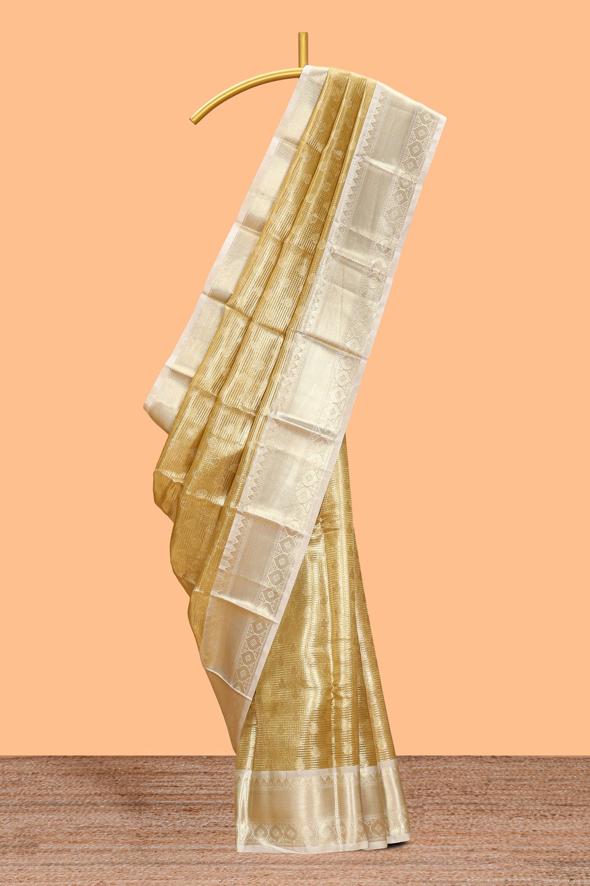 Bright gold zari butta design art tissue saree with contrast border and blouse