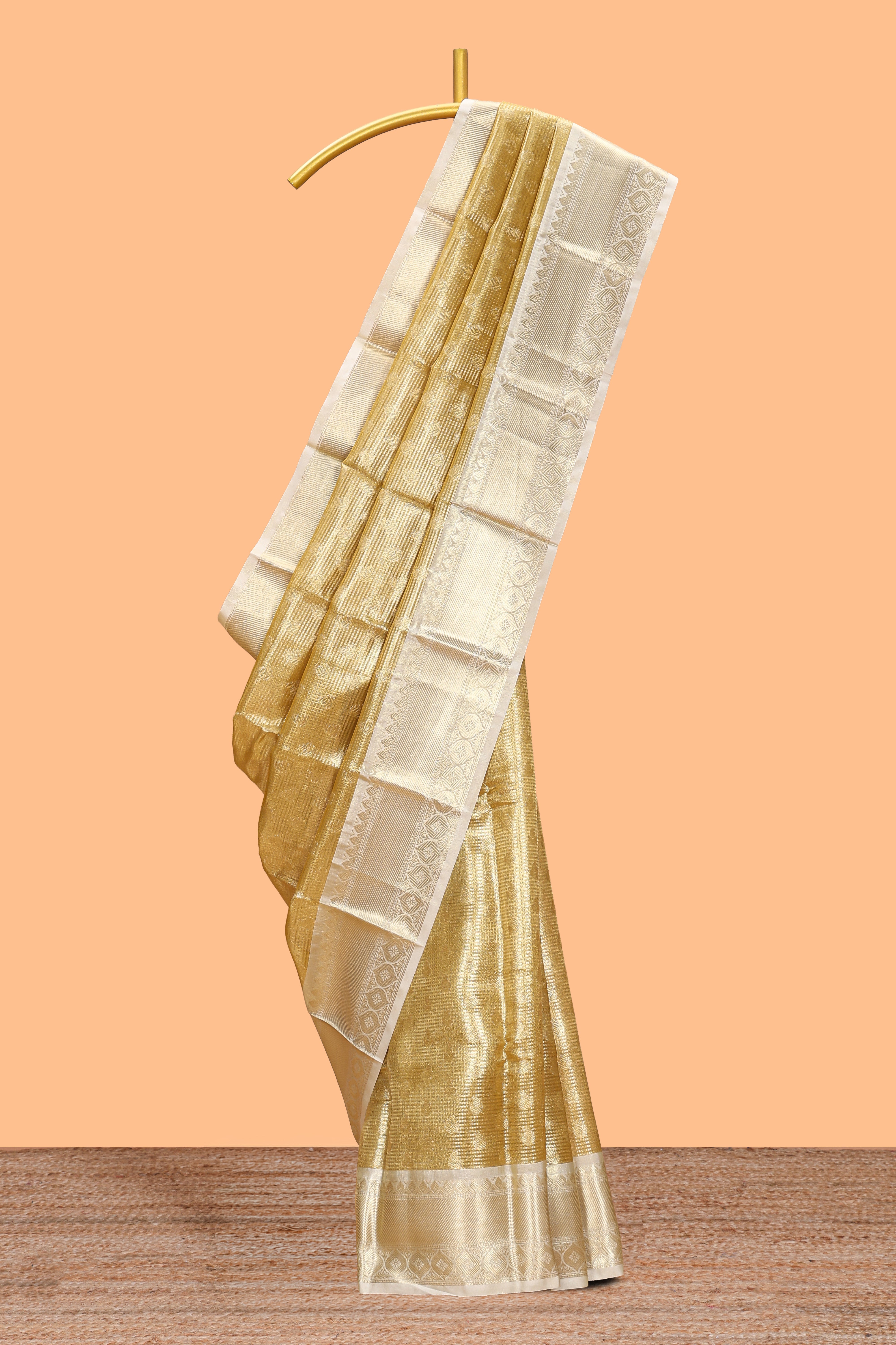 Bright gold zari butta design art tissue saree with contrast border and blouse