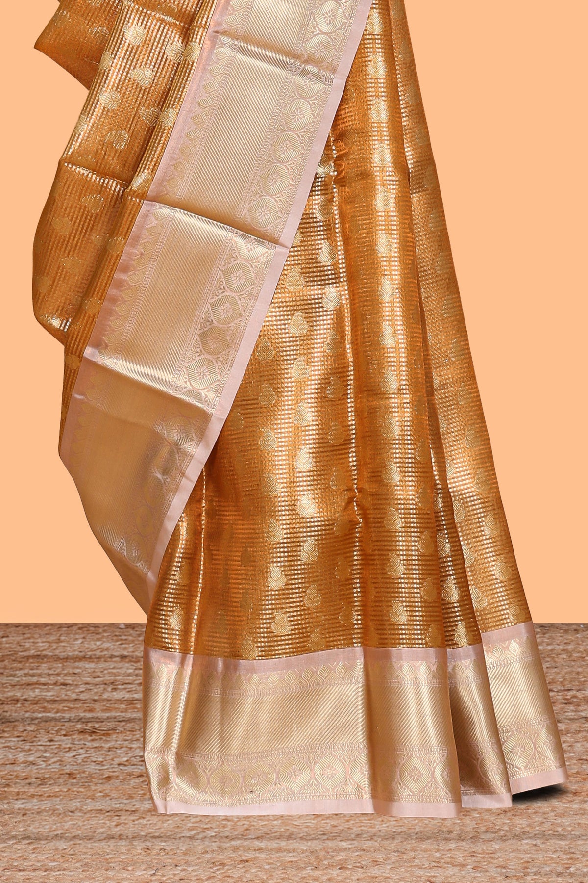 Rust orange zari butta design art tissue saree with contrast zari border and blouse