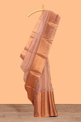 Coppor peach plain art tissue saree with contrast zari border and matching blouse