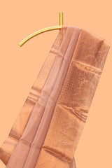 Coppor peach plain art tissue saree with contrast zari border and matching blouse