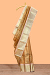 Bronze striped art tissue saree with contrast zari border and blouse