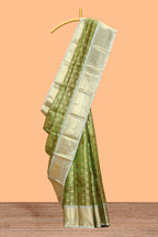 Green butta designs and striped art tissue saree with contrast zari border and blouse