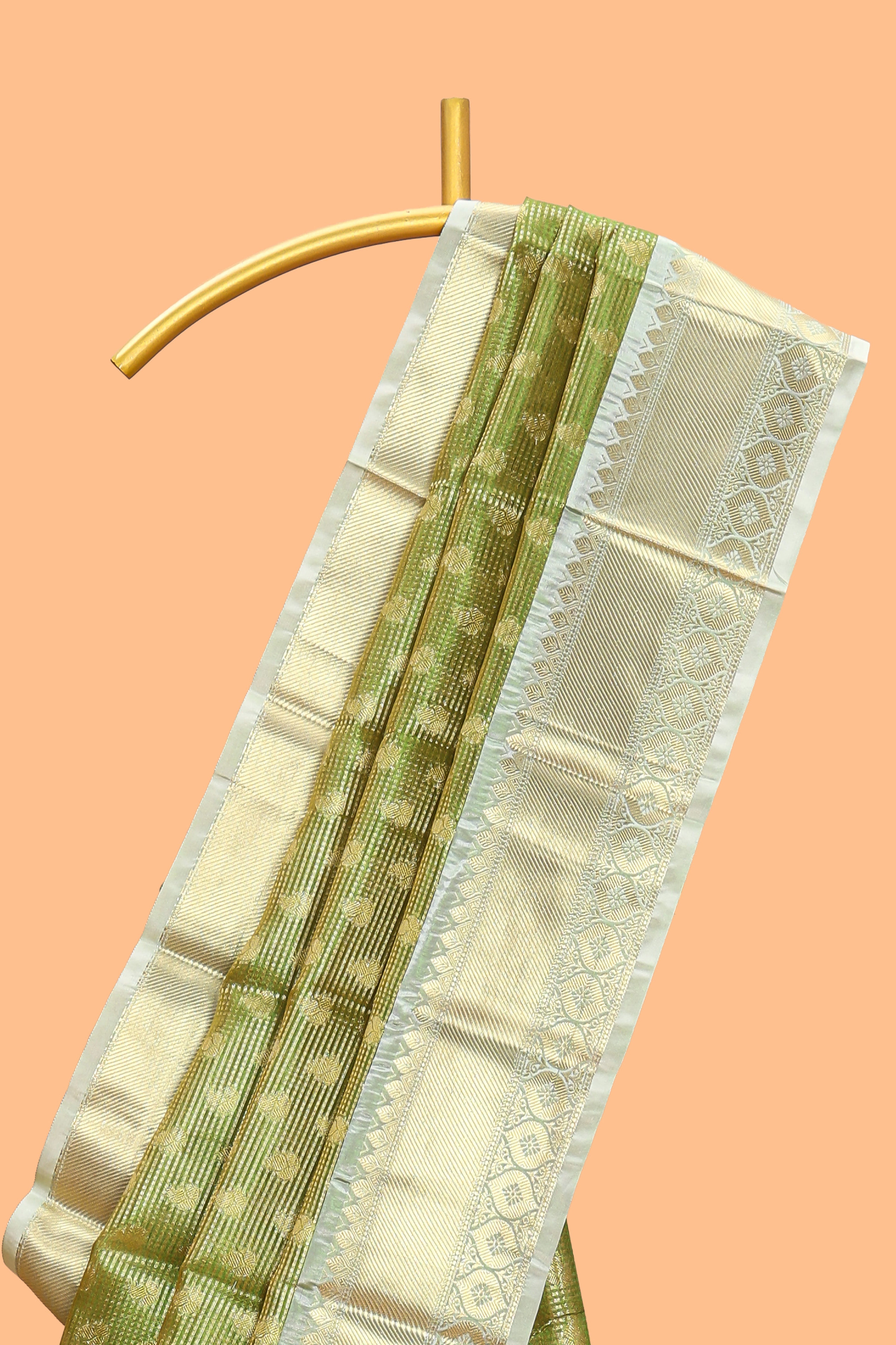 Green butta designs and striped art tissue saree with contrast zari border and blouse