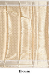 Gold zari motifs art tissue saree with contrast zari border and blouse