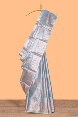 Mauve blue floral zari motifs design art tissue saree with self zari border and contrast blouse