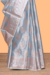 Mauve blue floral zari motifs design art tissue saree with self zari border and contrast blouse