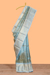 Blue zari design art tissue saree with self zari border and contrast blouse
