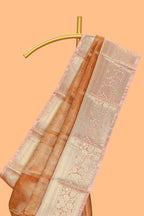 Orange zari design art tissue saree with contrast zari border and contrast blouse