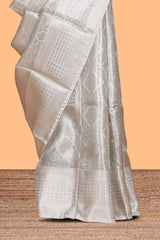 Grey floral zari design art tissue saree with contrast zari border and contrast blouse