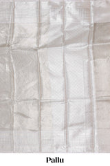 Grey floral zari design art tissue saree with contrast zari border and contrast blouse