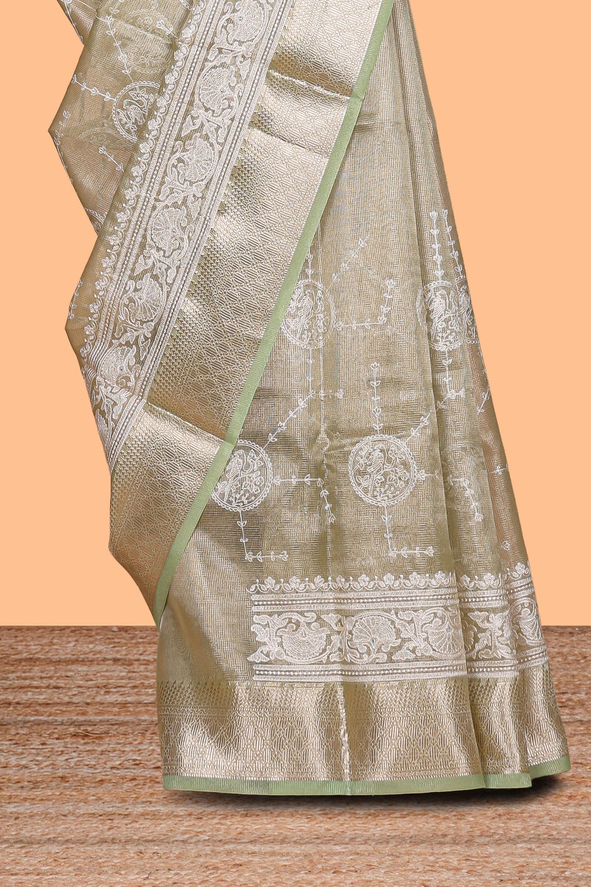 Sage green unique design art tissue saree with self zari border and matching blouse