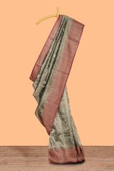 Olive green floral vine design art tissue saree with contrast zari border and blouse