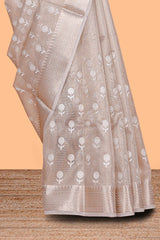 Beige floral butta art tissue saree with with self zari border and plain blouse