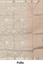 Pale green floral design art tissue saree with self zari border and plain blouse