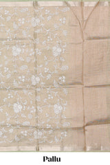 Pale green floral design art tissue saree with self zari border and plain blouse