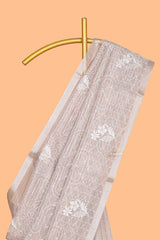 Almond beige unique design art tissue saree with flora design pallu and plain blouse