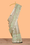 Moss green floral design art tissue saree with zari border and Plain blouse